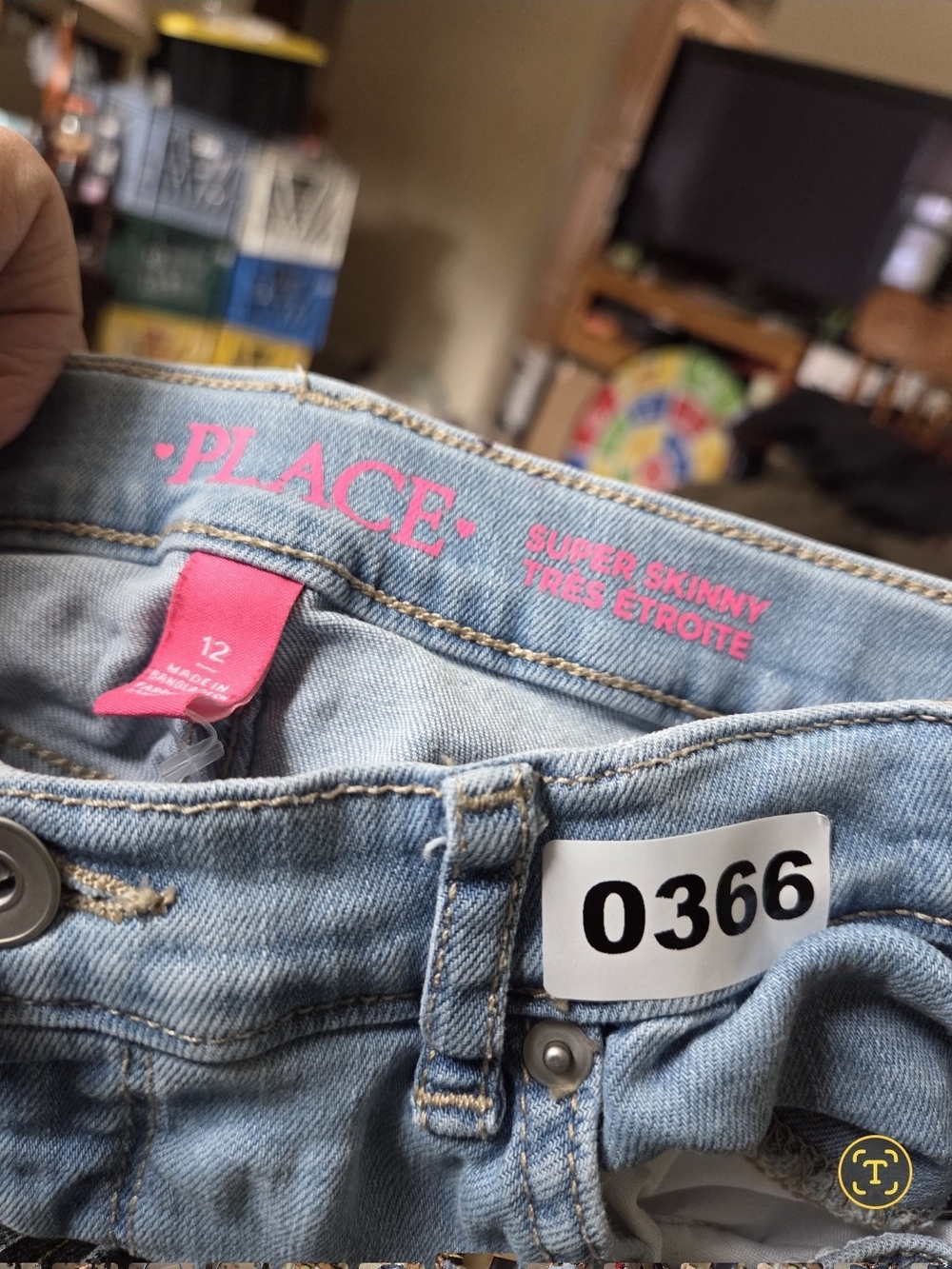 Place Light Wash Super Skinny Jeans with Pink Logo.
